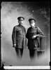Crown Studios, Auckland. Studio portrait of two soldiers. Hat badges denote YMCA army unit. Name from glass plate inscription: Lascelles. The younger soldier is probably Arthur Montague Lascelles, Service No. 52765. (Auckland War Memorial Museum Cenotaph record). Auckland Libraries Heritage Collections 7003-328. No known copyright restrictions