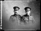 Crown Studios, Auckland. Studio portrait of two soldiers. Hat badges denote YMCA army unit. See also 7003-328. Historical note: The younger soldier is probably Arthur Montague Lascelles, Service No. 52765. (Auckland War Memorial Museum Cenotaph record). Auckland Libraries Heritage Collections 7003-336. No known copyright restrictions
