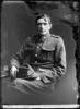 Crown Studios, Auckland. Studio portrait of an unidentified soldier. Hat and collar badges denote NZEF Infantry 23rd Reinforcements. Name from glass plate inscription possibly C Bannatyne. Auckland Libraries Heritage Collections 7003-339. No known copyright restrictions