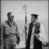 Photograph of The Reverend D.R.G.F. Graham-Brown and Captain Kahi Takimoana Harawira, Chaplain of 28 (Maori) Battalion in Beirut, Syria (now Lebanon) during the Second World War. Taken on 16 April 1942 by an official photographer. Alexander Turnbull Library, Wellington, DA-02444-F. Image is subject to copyright restrictions.