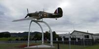 Photograph of a replica of Sir Keith Park's Hurricane aircraft, erected as a memorial to him at Thames airfield. Taken by Stoney Burke on the day of the memorial's dedication at the commemoration of the Battle of Britain, 13 September 2020.