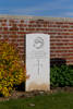 Headstone of Corporal Leslie Andres Burton (24/704). Cross Roads Cemetery, France. New Zealand War Graves Trust  (FREQ0015). CC BY-NC-ND 4.0.