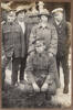 Five young men and one young woman. Three of the men wear army uniforms and one a navy uniform. Left: Donovan Graham Lunn; centre Vera Lunn (wearing a great coat); kneeling: Lionel Victor Lunn. The Lunn family lived at 5 Tui Street, Devonport. Gorphwysfa, Devonport, is listed on Lionel's enlistment forms. Auckland Libraries Heritage Collections 499-ALB116F-54-02.