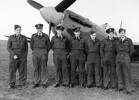 Group of South Island pilots of No. 485 Squadron, standing in front of a Spitfire. Unknown location. Image kindly provided by Air Force Museum of New Zealand PR8959.
