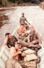 Travelling up river. Pte J. Richardson, Joe Chin Police Officer, Cpl M. Maytum, Pte B. Hills. Image taken during Malayan Emergency 1959-1960. © Peter Gallacher.