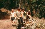 Clearing old road to tin mine. Ptes Matum, Ring, Walker-Grace, Gallacher & Police Field Force Officer. Image taken during Malayan Emergency 1959-1960. © Peter Gallacher.