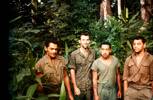 These 4 members of 10 Pl were charged and put on C.B. for not shaving when returning froma 4 day patrol. 7 days guard duty from4 a.m. to stand to at dawn (Very tired boys). Image taken during Malayan Emergency 1959-1960. © Peter Gallacher.