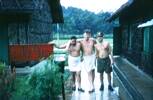 Three soldiers outside D Company 2 Regiment barracks after a shower. E. J. G. Ormsby, A. McCutcheon, Mick Ring. Image taken during Malayan Emergency 1959-1960. © Peter Gallacher.
