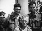 Three soldiers from 19 Army Tps, returning to Egypt from Crete, on HMS Phoebe. From left to right: Norm Jull, Snowy Close, and Harry Gregory. Photograph taken by EKS Rowe. Image kindly provided by National Library DA-11001-F