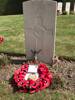 Photograph of Edward Angel's grave at Ramparts Cemetery, with wreath laid. Image kindly provided by Susan Fortescue (February 2022).