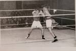Photograph of Peter Tait (right) representing RNZN in boxing match. Image kindly provided by Michael Tait (August 2022).