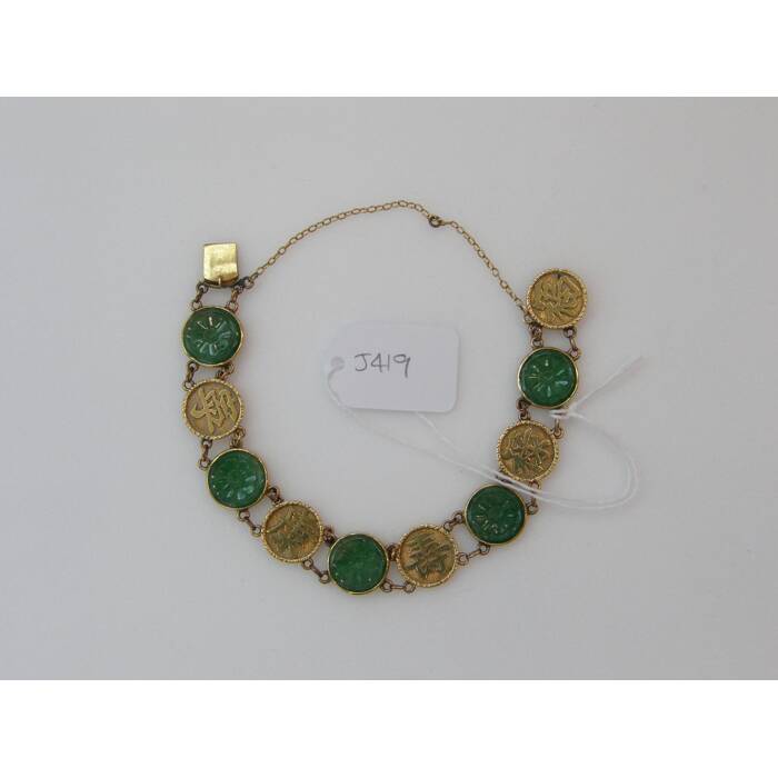 gold and jade bracelet