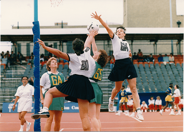 Netball players in action